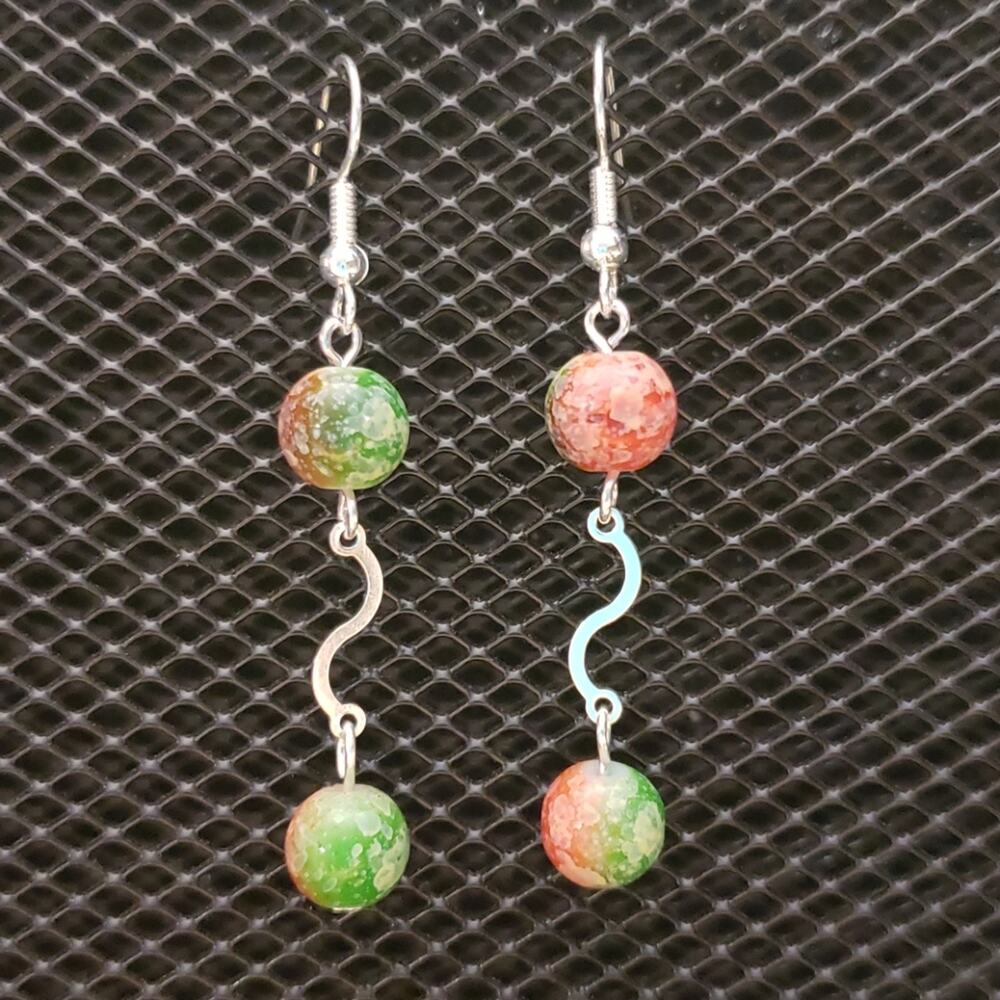 Green, white and orange dangle earrings